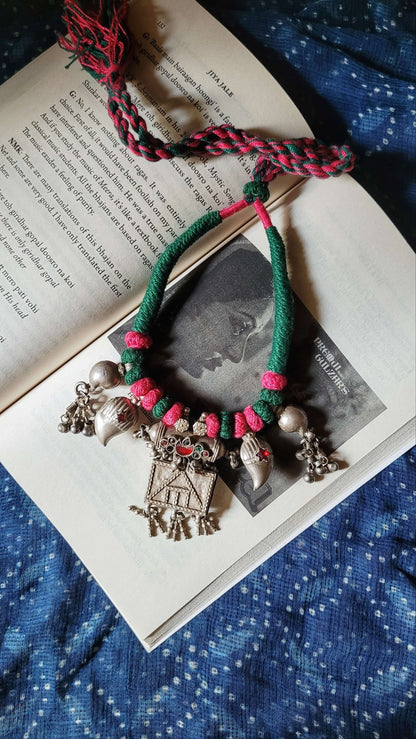Side view of Lutf Vintage Necklace in pure silver with vintage detailing