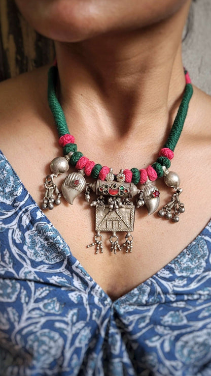 Side view of Lutf Vintage Necklace in pure silver with vintage detailing