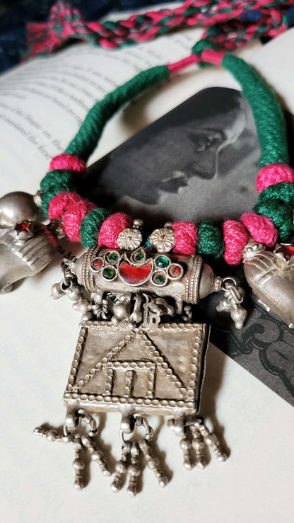 Side view of Lutf Vintage Necklace in pure silver with vintage detailing