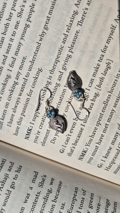 Side view of Maeri Earrings in pure silver with handcrafted detailing