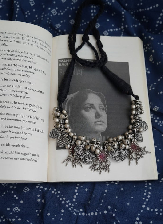 Side view of Maitreyi Vintage Necklace in pure silver with vintage detailing