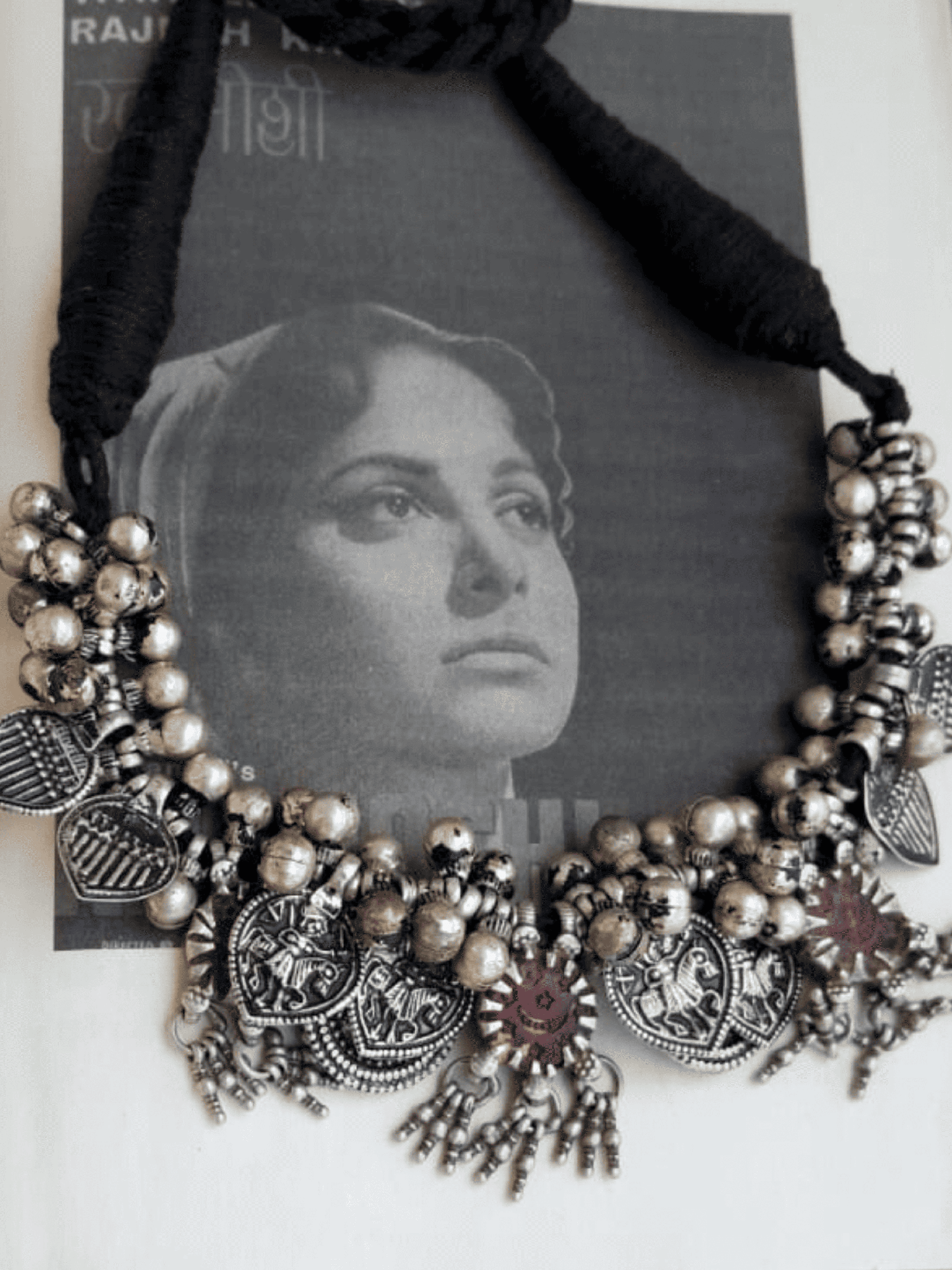 Side view of Maitreyi Vintage Necklace in pure silver with vintage detailing