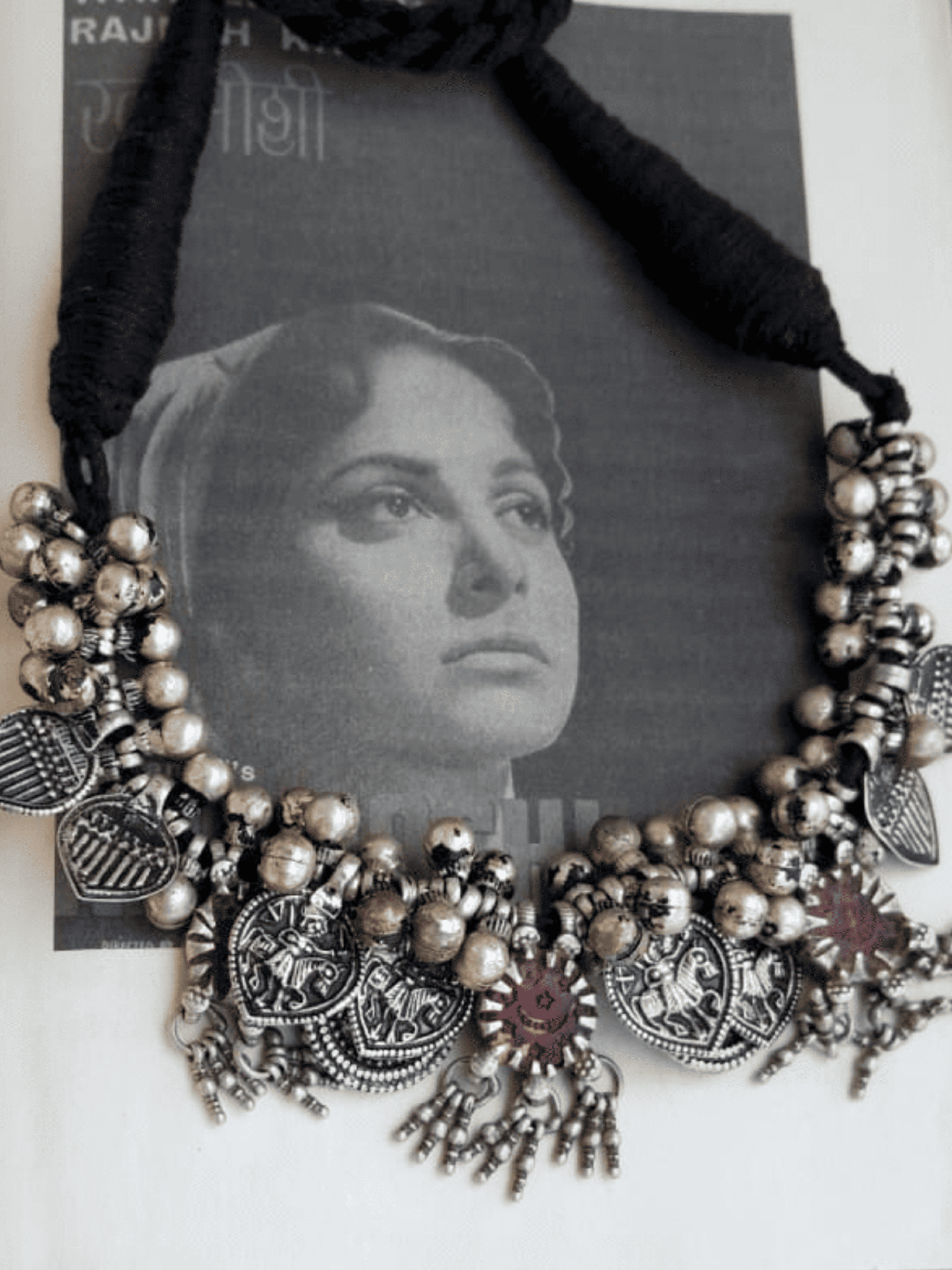 Side view of Maitreyi Vintage Necklace in pure silver with vintage detailing