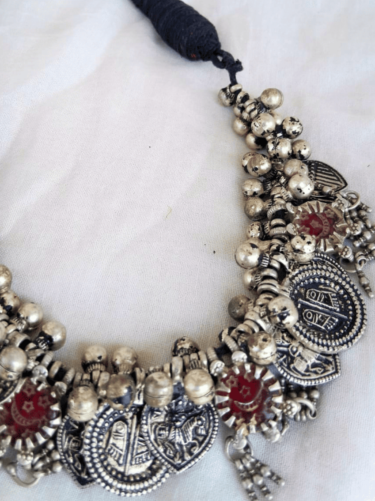Side view of Maitreyi Vintage Necklace in pure silver with vintage detailing
