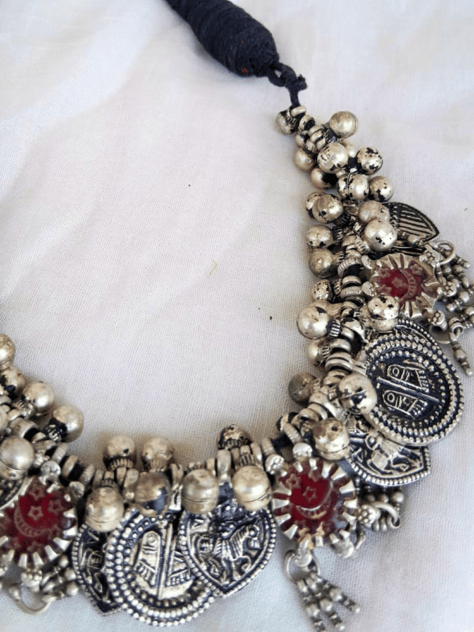 Side view of Maitreyi Vintage Necklace in pure silver with vintage detailing