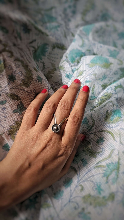 Side view of Malini Vanki Ring in pure silver with handcrafted detailing