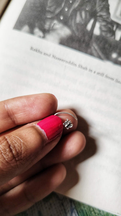 Side view of Manchala Nose-Pin in pure silver with handcrafted detailing