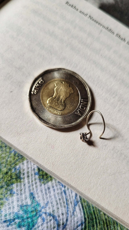 Side view of Manchala Nose-Pin in pure silver with handcrafted detailing