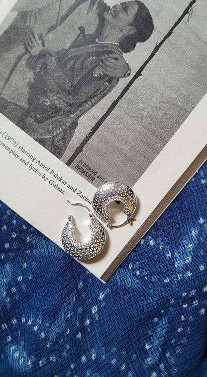 Side view of Marie Hoops in pure silver with handcrafted detailing