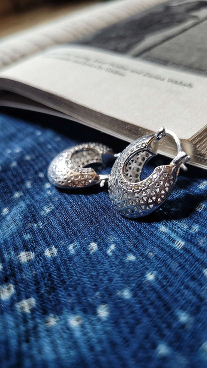 Side view of Marie Hoops in pure silver with handcrafted detailing