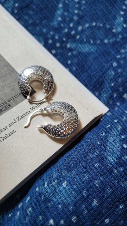 Side view of Marie Hoops in pure silver with handcrafted detailing