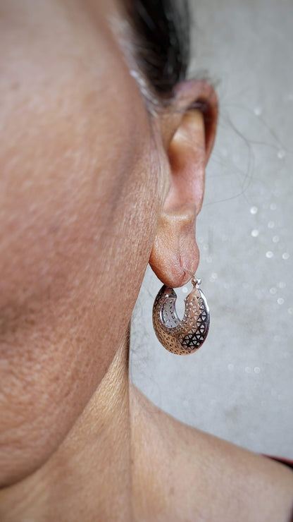 Side view of Marie Hoops in pure silver with handcrafted detailing