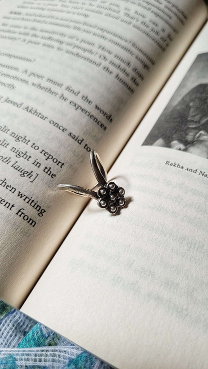Side view of Maulsari Vanki Ring in pure silver with handcrafted detailing