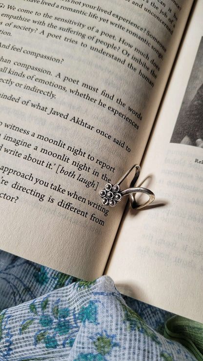 Side view of Maulsari Vanki Ring in pure silver with handcrafted detailing