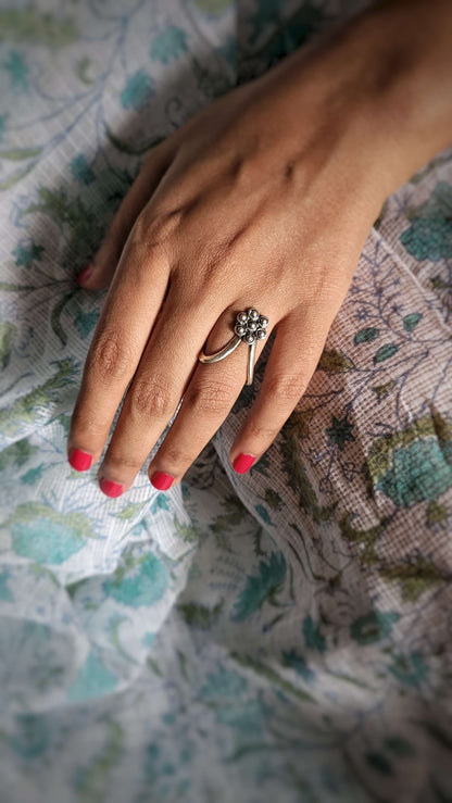 Side view of Maulsari Vanki Ring in pure silver with handcrafted detailing