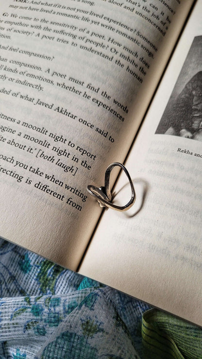 Side view of Maulsari Vanki Ring in pure silver with handcrafted detailing