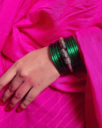 Side view of Mayurmukhi Kada in pure silver with handcrafted detailing