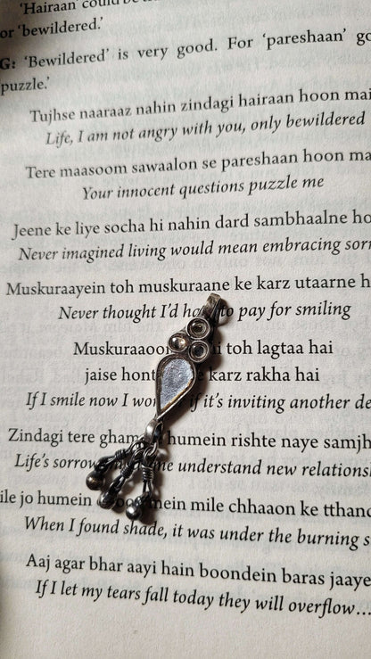 Side view of Mehtaab Vintage Pendant in pure silver with vintage detailing