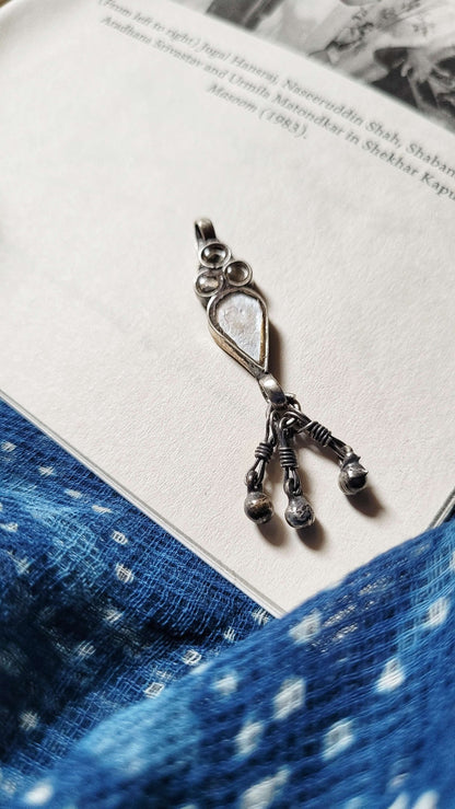 Side view of Mehtaab Vintage Pendant in pure silver with vintage detailing