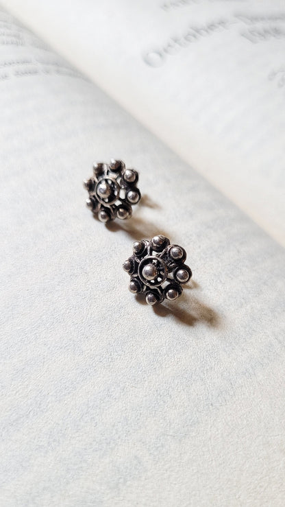 Side view of Mini Studs in pure silver with handcrafted detailing