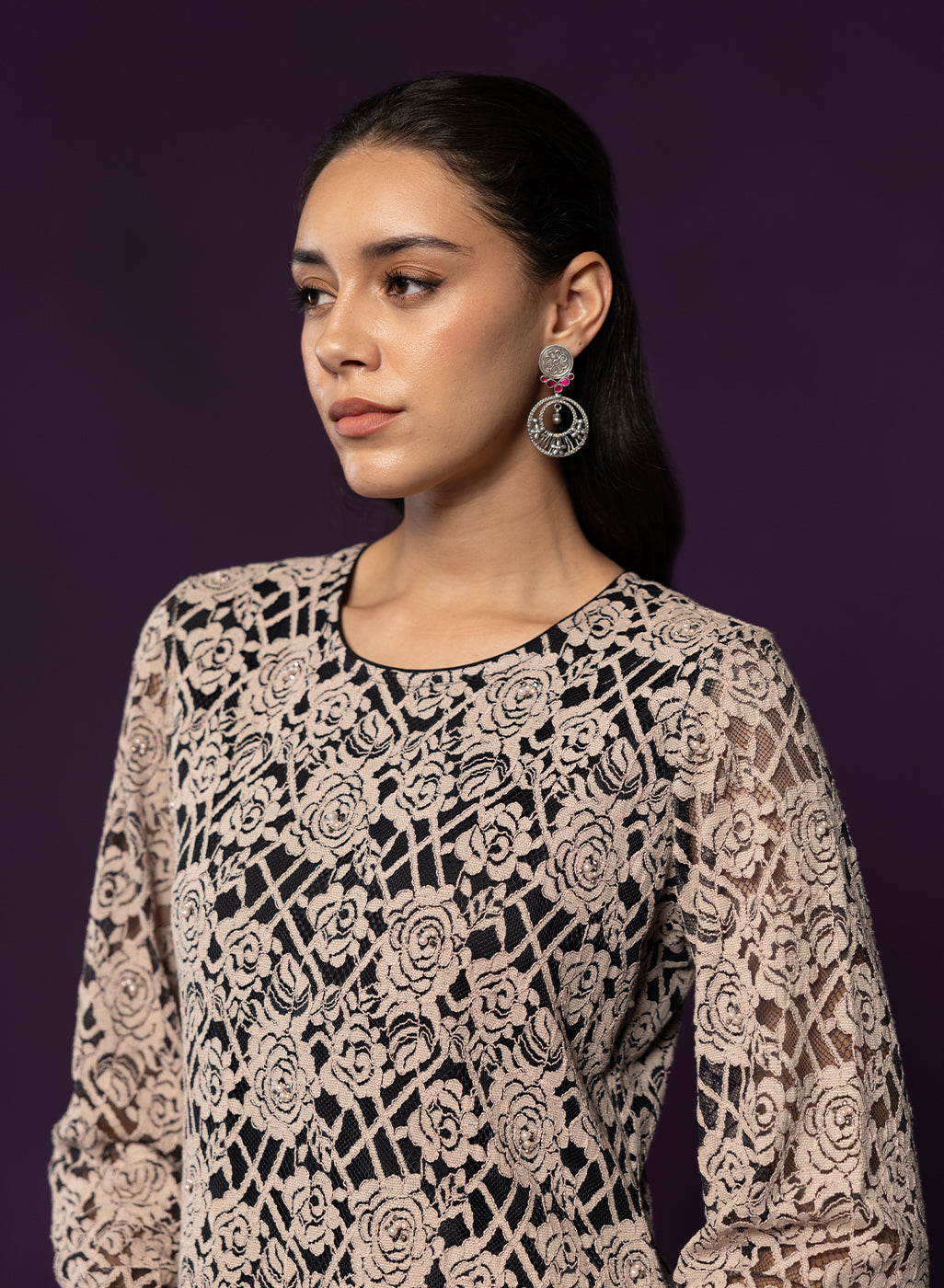 Side view of Moh Earrings in pure silver with handcrafted detailing