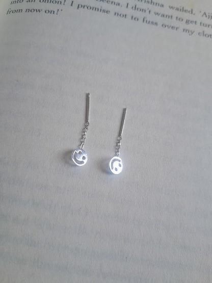92.5 silver sui dhaaga earrings with a cut-out silver smiley face on linear chain. No back needed. The earring that reminds you to smile back at life. Cute, lightweight, daily wear. Shop Sadabahaar Jewelry.