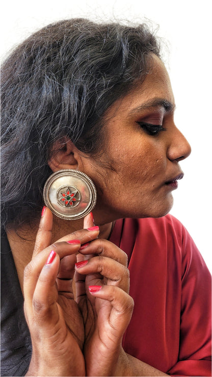 Side view of Nirjhari Earrings in pure silver with handcrafted detailing