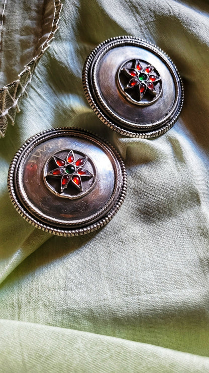 Side view of Nirjhari Earrings in pure silver with handcrafted detailing