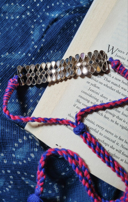 Side view of Nishchhal Choker in pure silver with handcrafted detailing