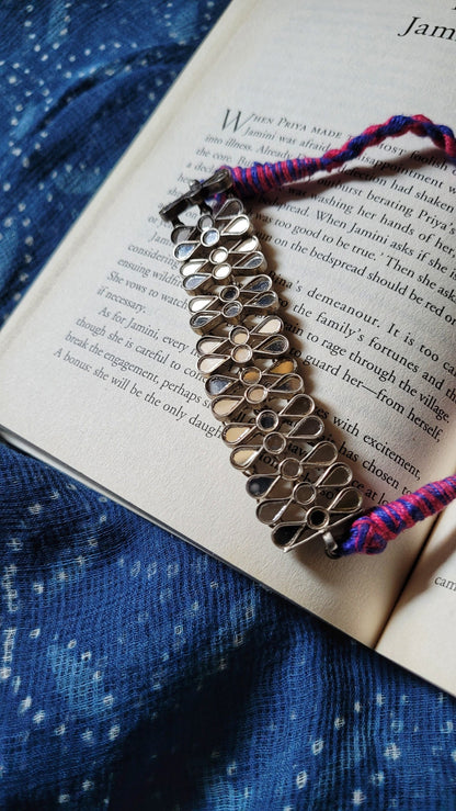 Side view of Nishchhal Choker in pure silver with handcrafted detailing