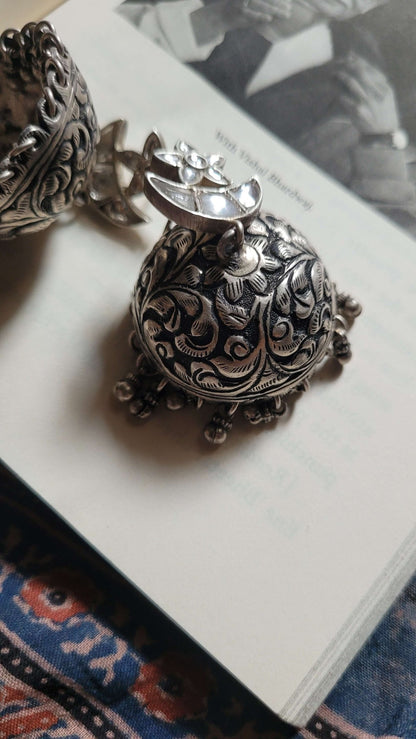 Side view of Noorani Jhumka in pure silver with handcrafted detailing