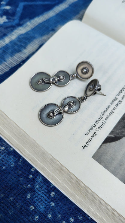 Side view of O Re Chiraiyya Earrings in pure silver with handcrafted detailing