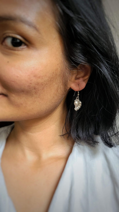 Paakhi Earrings in pure silver with handcrafted detailing