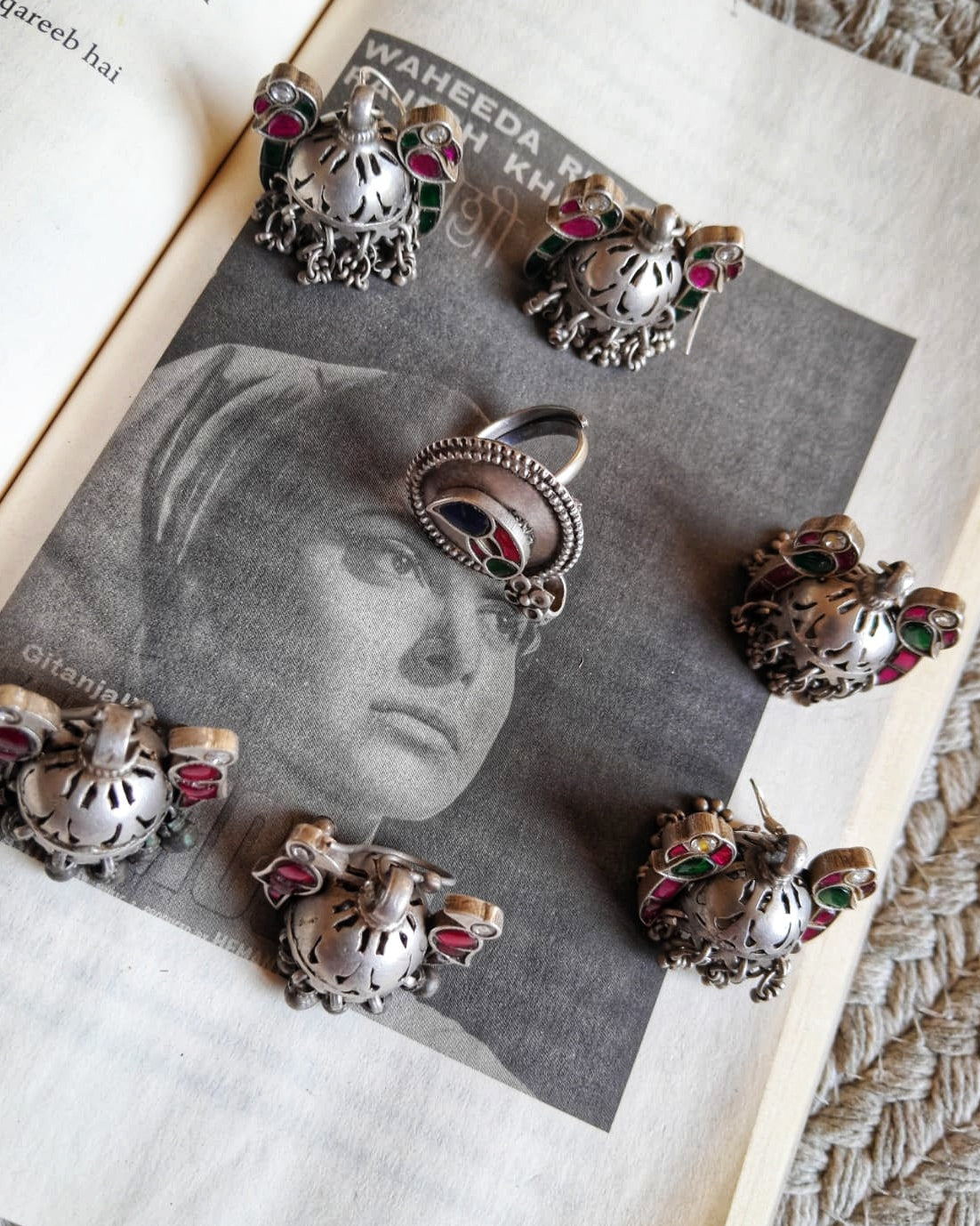 Side view of Pancchi Jhumka in pure silver with handcrafted detailing