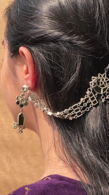 Side view of Parvaani Earrings in pure silver with handcrafted detailing