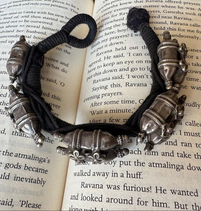Side view of Parveen Vintage Paunchi/Bracelet in pure silver with vintage detailing