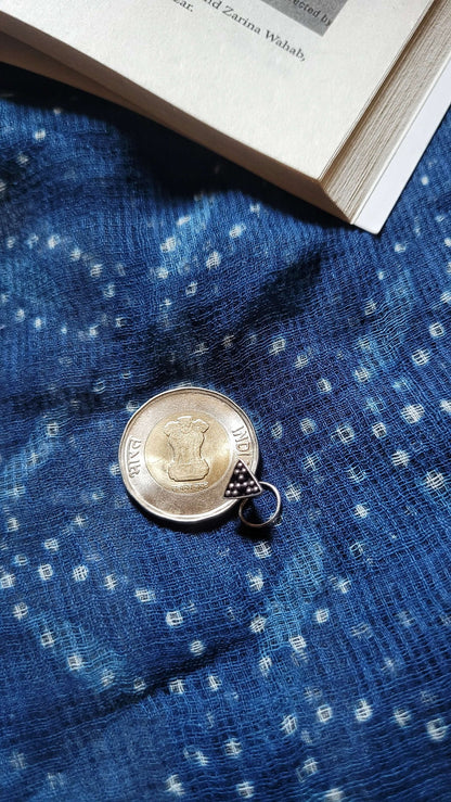 Side view of Patang Nose-Pin in pure silver with handcrafted detailing