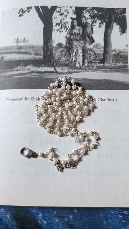 Side view of Chidiya Chugg Gayi Khet Pendant in pure silver with handcrafted detailing
