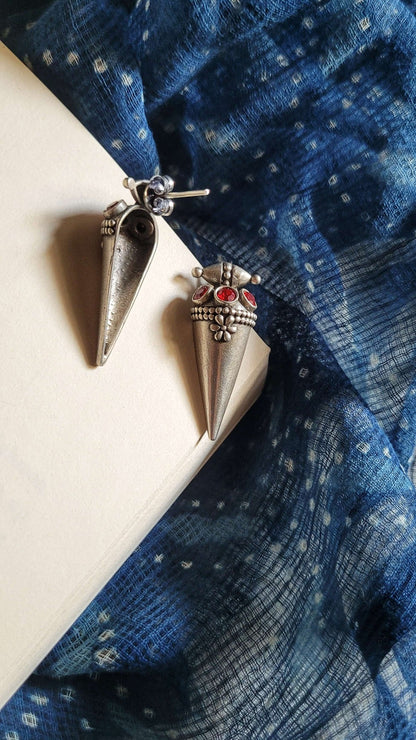 Side view of Poppy Earrings in pure silver with handcrafted detailing