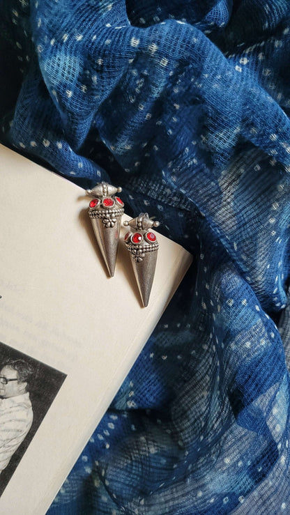 Side view of Poppy Earrings in pure silver with handcrafted detailing