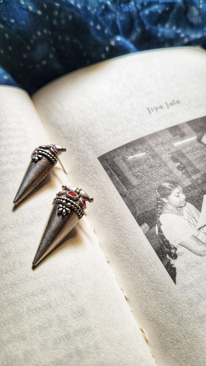 Side view of Poppy Earrings in pure silver with handcrafted detailing