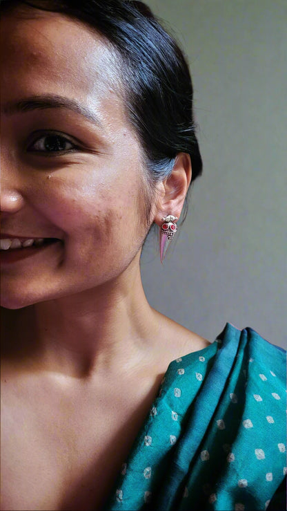 Side view of Poppy Earrings in pure silver with handcrafted detailing