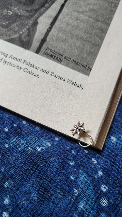 Side view of Prachi Nose-Pin in pure silver with handcrafted detailing