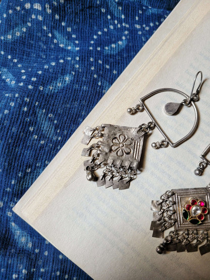 Side view of Prajjwala Earrings in pure silver with handcrafted detailing
