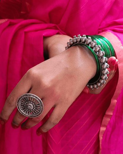 Side view of Priyadarsini Kada in pure silver with handcrafted detailing