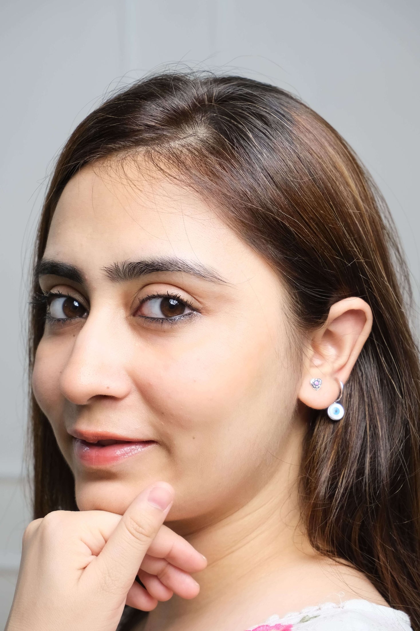 Side view of Pulkit Studs in pure silver with handcrafted detailing