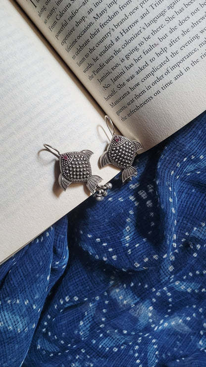 Side view of Rayini Earrings in pure silver with handcrafted detailing
