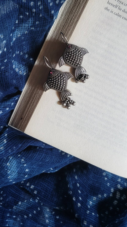 Side view of Rayini Earrings in pure silver with handcrafted detailing
