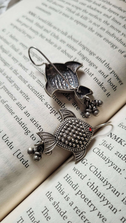 Side view of Rayini Earrings in pure silver with handcrafted detailing