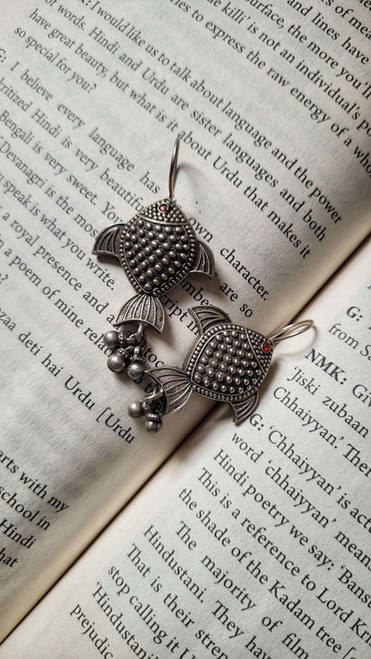 Side view of Rayini Earrings in pure silver with handcrafted detailing